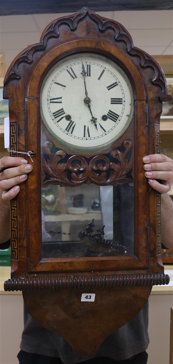 An inlaid walnut Victorian wall clock